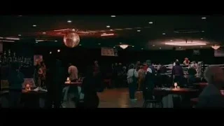 disco ball in lively bar — Creed 3