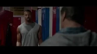 man standing in locker room — Creed