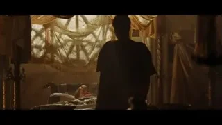 person silhouette by window with curtains — Gladiator
