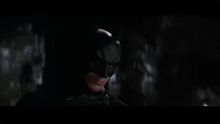 Batman standing in his iconic black suit — Batman