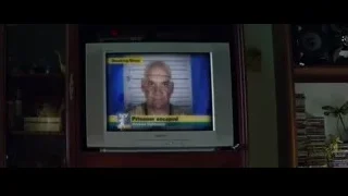 boy watching 'Prisoner escaped' mugshot on TV — The Amazing Spider Man 2