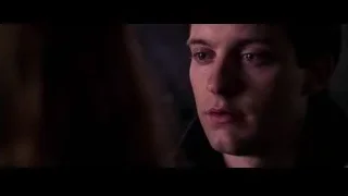young man with closed eyes in dim room — Spider Man 2