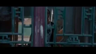 young woman behind metal bars — The Karate Kid