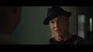 Older man in hat looking at camera — Creed 2
