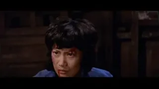 person's face with red mark in dimly lit room — Bruce Lee: Enter The Dragon