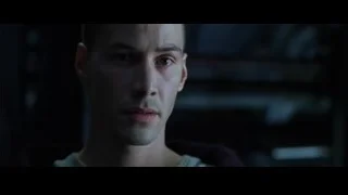 man in black jacket and baseball cap — The Matrix
