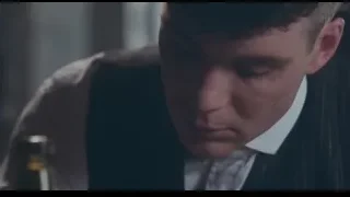 man deep in thought with wine bottle — Peaky Blinders