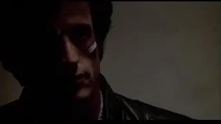 man close-up serious expression eyes closed — Rocky III