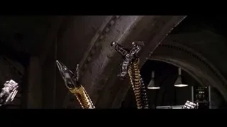futuristic robotic arms in dark tunnel — Spider Man 2