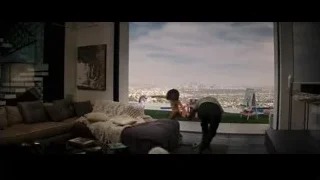 Children on sofa in living room with city view — Creed 3