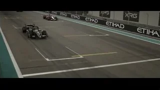 Formula One cars racing on track — F1