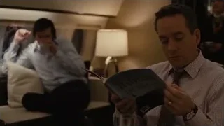 men sitting on airplane couch — Succession