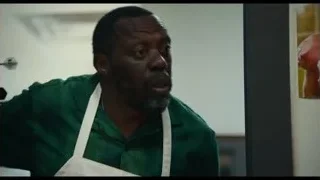 Man with serious expression in kitchen — The Bear