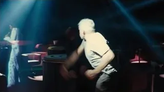 two men talking in dimly lit bar — Blade Runner 2049