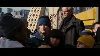 people gathered around yellow bus — Batman: The Dark Knight Rises