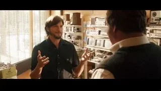 two men with electronic equipment in store — Jobs
