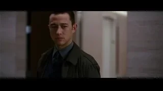 young man standing in dim hallway — Batman: The Dark Knight Rises