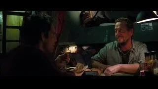 Two men eating in dim restaurant — The Secret Life of Walter Mitty