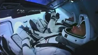 astronaut resting in spaceship cockpit — Elon Musk: Return to Space