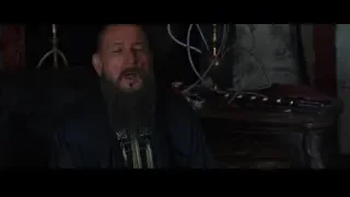 bearded man in dark room thinking — Iron Man 3