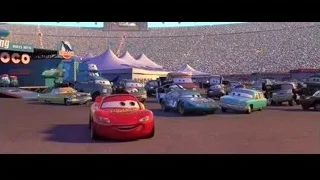 Lightning McQueen driving on track with crowd — Cars
