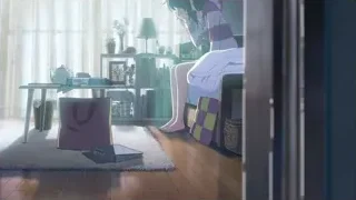 young woman sitting on bed looking at phone — Your Name