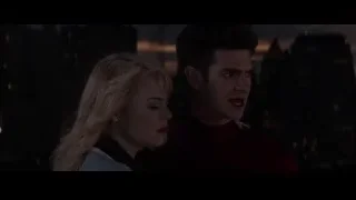man and woman in city at night — The Amazing Spider Man 2