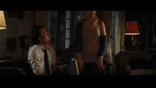 man and woman looking at book — Now You See Me