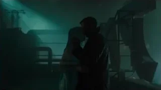Man and woman embracing in abandoned room — Blade Runner 2049