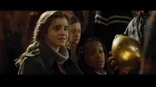three girls looking at golden globe — Harry Potter and the Goblet of Fire