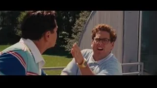 two men in heated argument shouting — The Wolf Of Wall Street