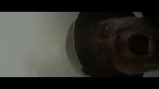 man lying injured on ground — Hacksaw Ridge