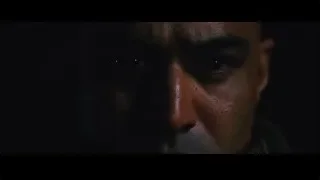 Man's serious face in the dark — Iron Man