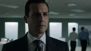 Man in suit looking aside in hallway — Suits