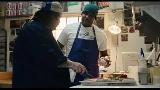 two men preparing food in kitchen — The Bear