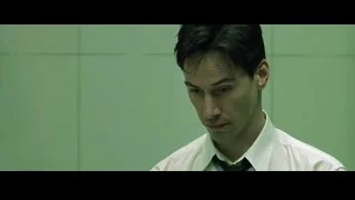 man in shirt and tie against green wall — The Matrix