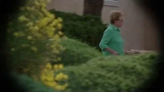 Elderly woman walking on gravel path — Breaking Bad
