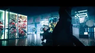 person holding knife in front of screen — John Wick: Chapter 4
