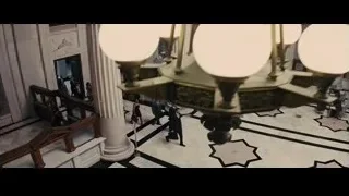 people walking through grand marble lobby — Now You See Me