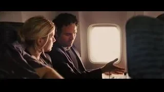 man and woman talking in airplane — Now You See Me