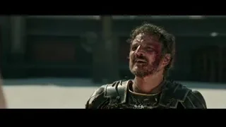 battle-ready man in black gold armor — Gladiator 2