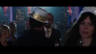 two men in party hats at event — Iron Man 3