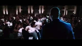 man in suit giving speech at banquet — Iron Man