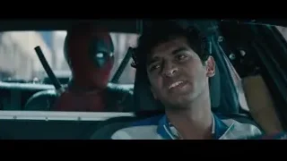 man driving car with Deadpool — Deadpool 2