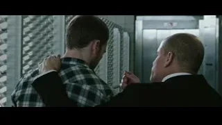 two men in room with metal door — Now You See Me 2