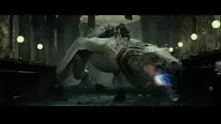 Dragon statue inside dark church — Harry Potter and the Deathly Hallows 2