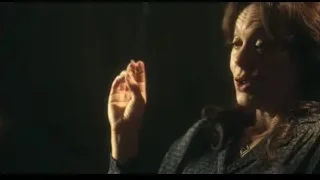 woman holding hand in prayer in dim room — Peaky Blinders