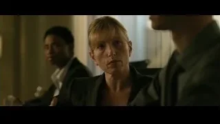 woman in deep thought at table — The Social Network