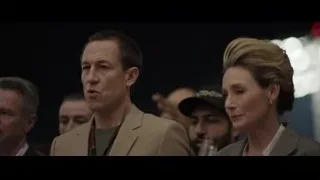 Man and woman in a crowd — F1