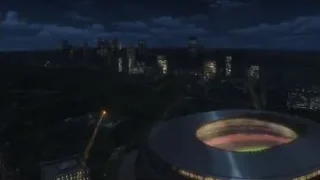 city at night with fireworks over stadium — Weathering with You